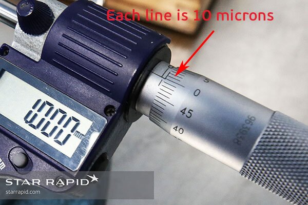 The digital readout helps to confirm the reading on the vernier scale.