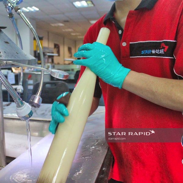 Hand finishing a CNC part